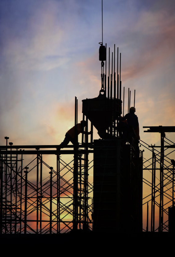 Construction site with workers and scaffolding