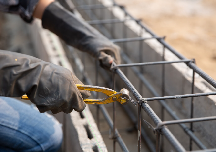 Modern construction site with cranes and scaffolding